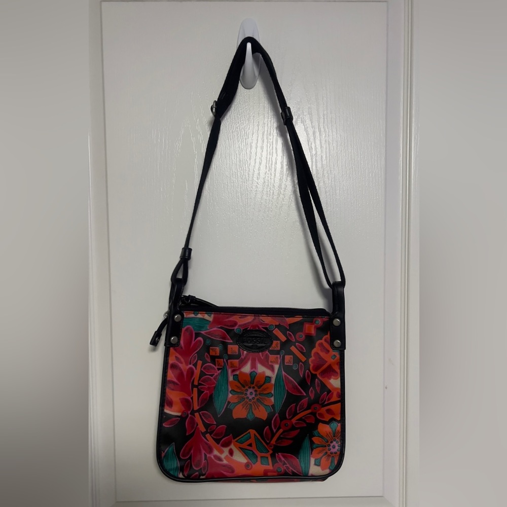 Fossil brand canvas waxed shoulder strap purse.
